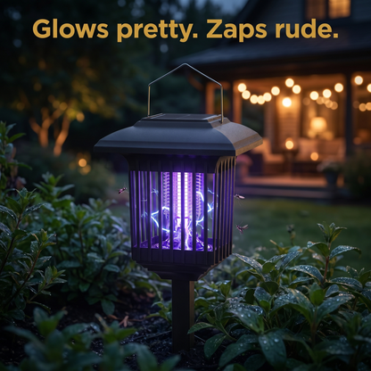 Rascal Solar Bug Lantern glowing purple in a garden at dusk